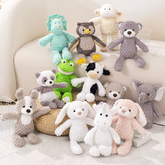 Collection of calming animal plush toys - multiple characters including dinosaur, owl, bear, panda, and cow