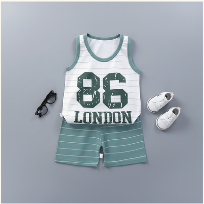 Flat lay product photo of baby London clothing set with accessories